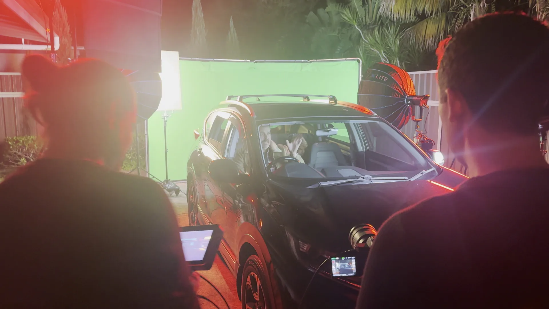 Child actor in backseat between takes